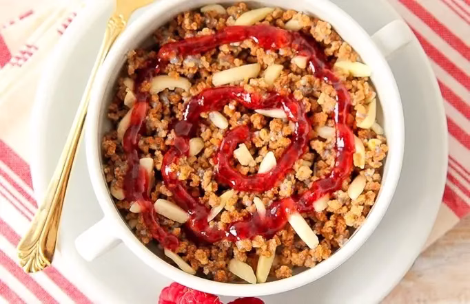 raspberry jelly swirled on hot Grape-Nuts