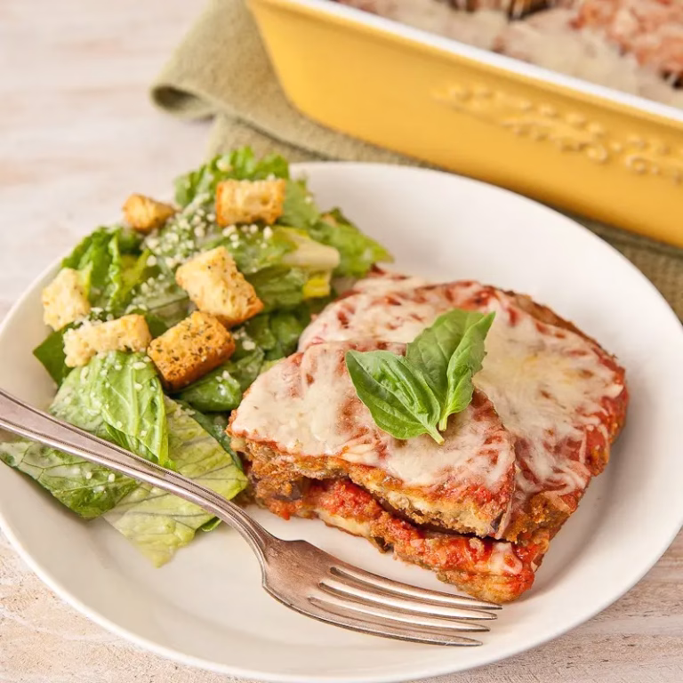 eggplant parmesan and a caesar salad