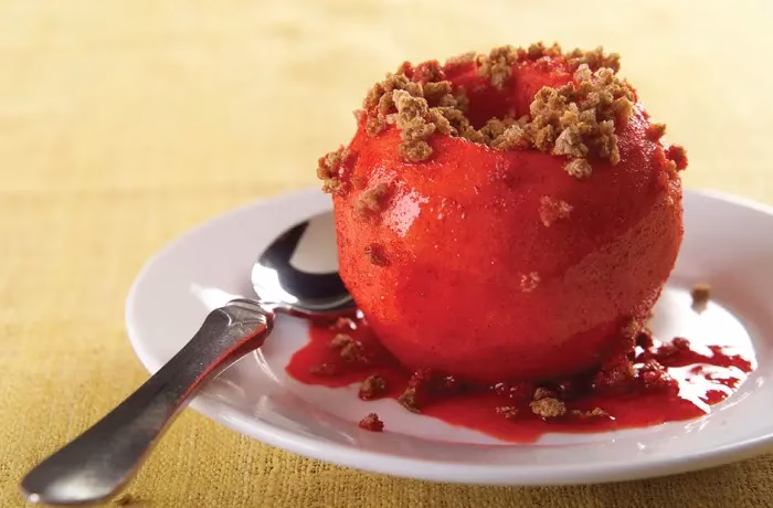 a candied apple topped with Grape-Nuts