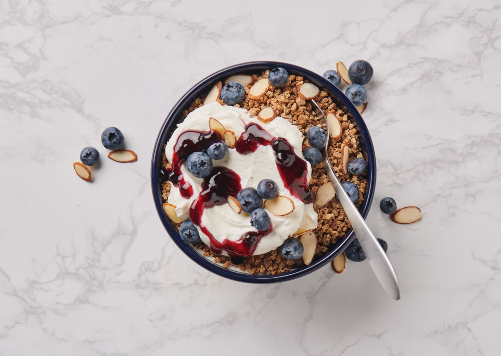 Grape-Nuts cereal with yogurt and blueberries in a bowl